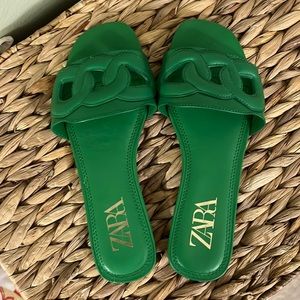 Green flat sandals